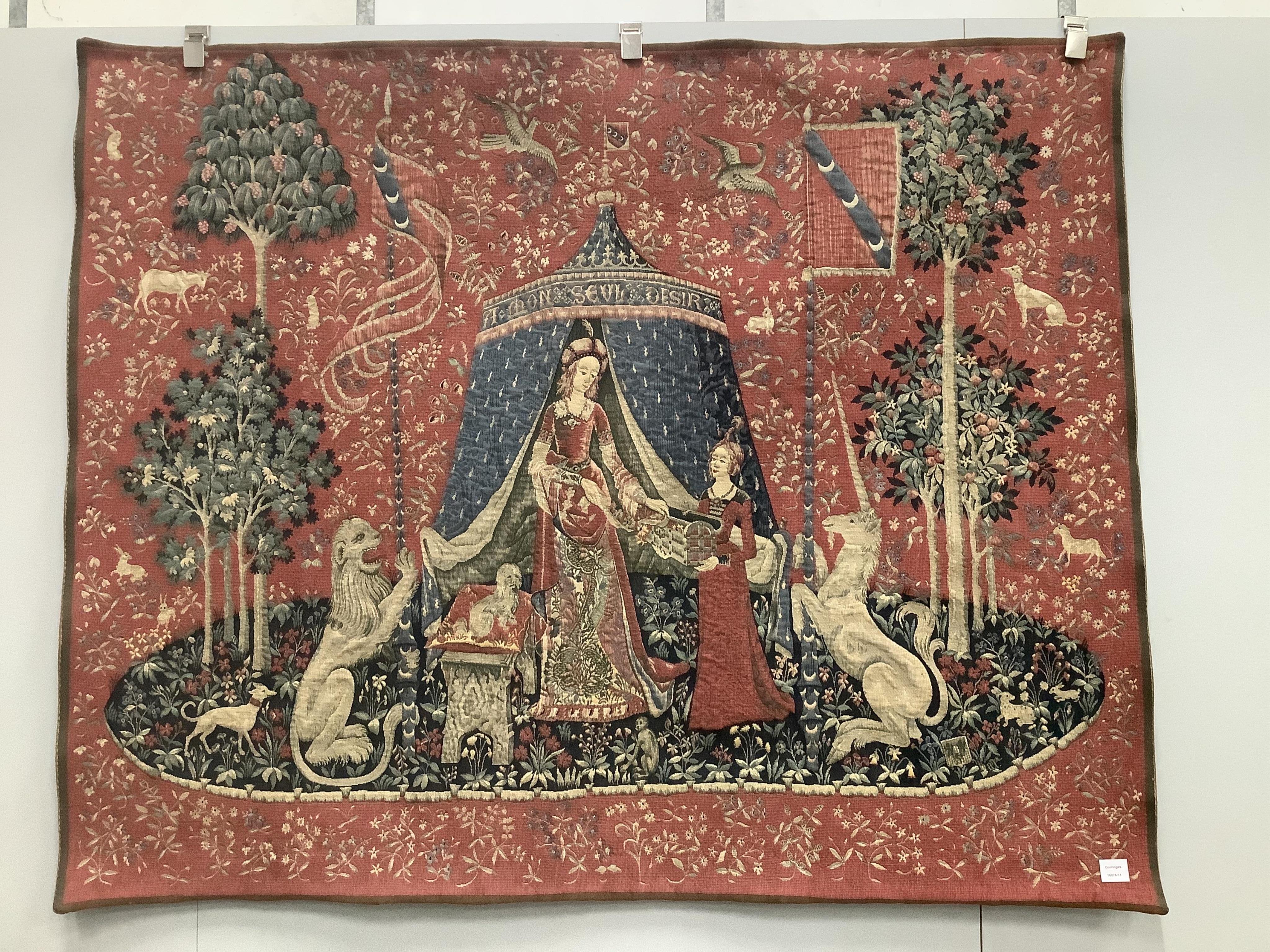 A Lady and the Unicorn hand embroidered tapestry, after the 15th century original in the Cluny Museum, width 162cm, height 134cm. Condition - fair